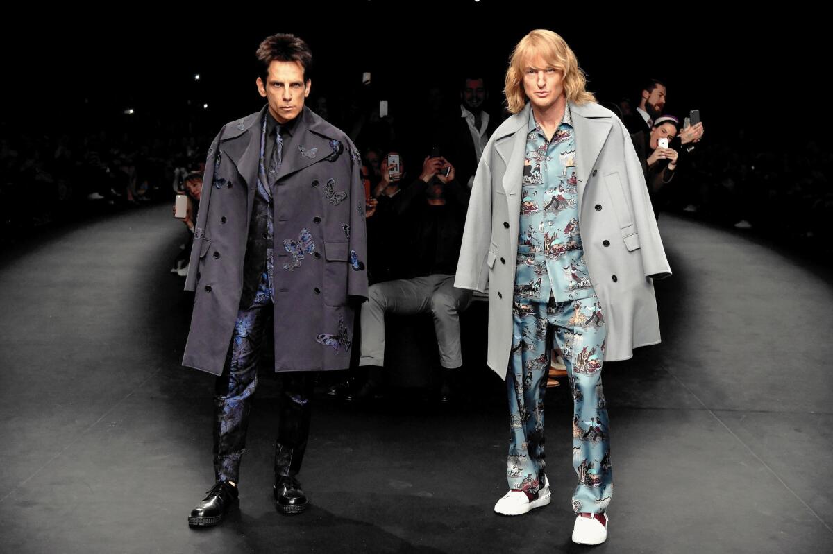 Ben Stiller, left, as Derek Zoolander and Owen Wilson as Hansel walk Valentino's runway in Paris, drawing attention to the fashion show and a "Zoolander" sequel.