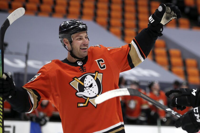 Anaheim Ducks center Ryan Getzlaf, left, celebrates with defenseman Jamie Drysdale, who scored in his NHL debut.