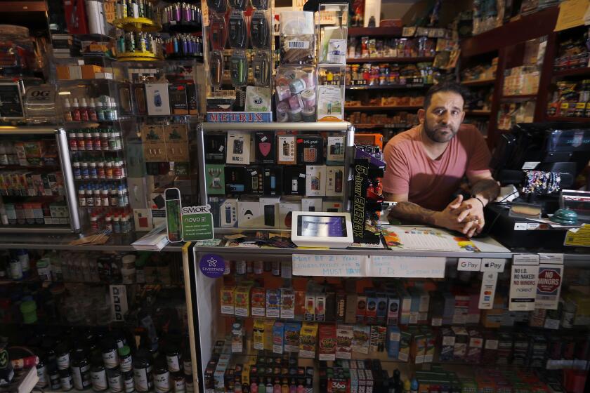 ALTADENA, CALIF. - OCT. 2, 2019. Jacob Grair, owner of Ace Vape Shop in Altadena, said 80 percent of his sales are flavored tobacco and vaporizer products. (Luis Sinco/Los Angeles Times)