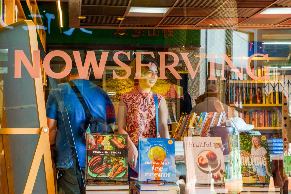 In a bookstore, patrons browse