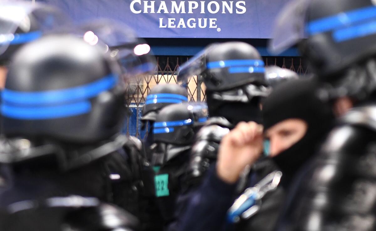 Riot police officers stand inside the stadium prior the UEFA Champions League Group A football match between Paris Saint-Germain (PSG) and Galatasaray at the Parc des Princes stadium in Paris on December 11, 2019. (Photo by FRANCK FIFE / AFP) (Photo by FRANCK FIFE/AFP via Getty Images) ** OUTS - ELSENT, FPG, CM - OUTS * NM, PH, VA if sourced by CT, LA or MoD **