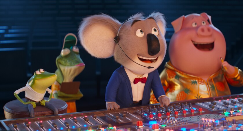 This image released by Illumination Entertainment and Universal Pictures shows, from second left, Miss Crawly, voiced by Garth Jennings, Buster Moon, voiced by Matthew McConaughey, and Gunter, voiced by Nick Kroll, from the animated film "Sing 2." (Illumination Entertainment and Universal Pictures via AP)