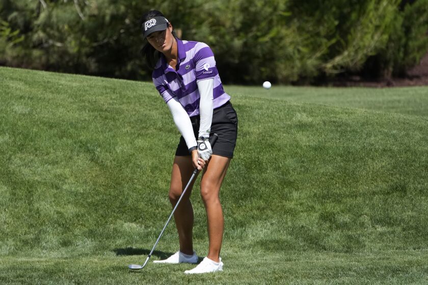 Celine Boutier chips onto the ninth green during the first day of round-robin play in the LPGA Bank of Hope Match Play golf tournament Wednesday, May 24, 2023, in North Las Vegas, Nev. (AP Photo/John Locher)