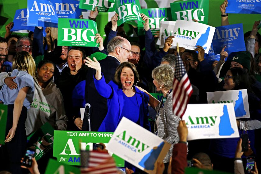 Sen. Amy Klobuchar reacts during her primary night event at the Grappone Conference Center in Concord, N.H.