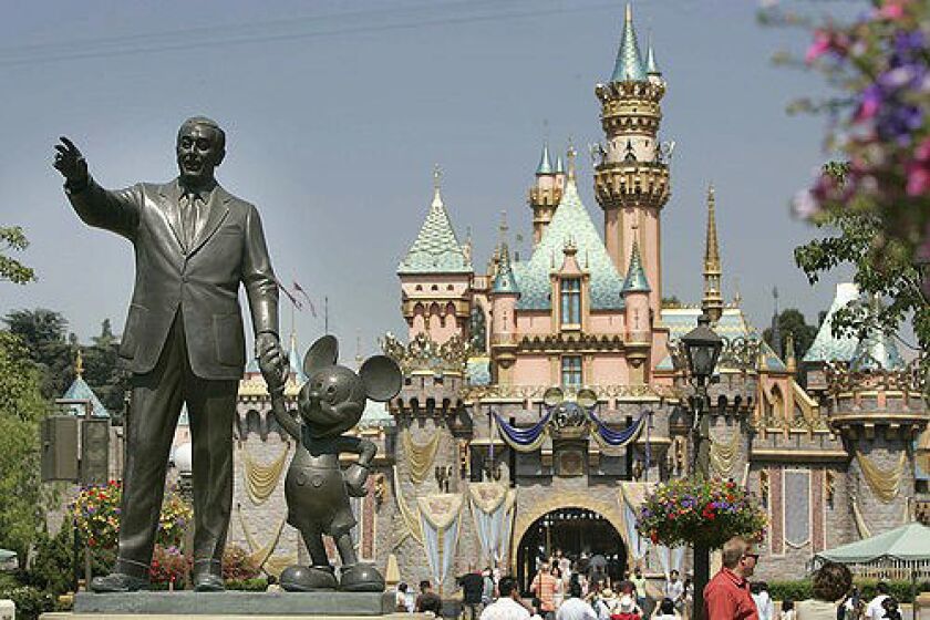 Two American icons--Walt Disney and Mickey Mouse--are memorialized at the Sleeping Beauty Castle in Disneyland.