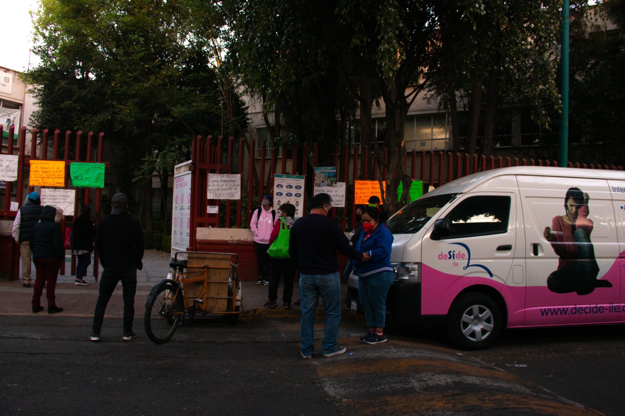 A CAM van is parked outside the México España clinic.