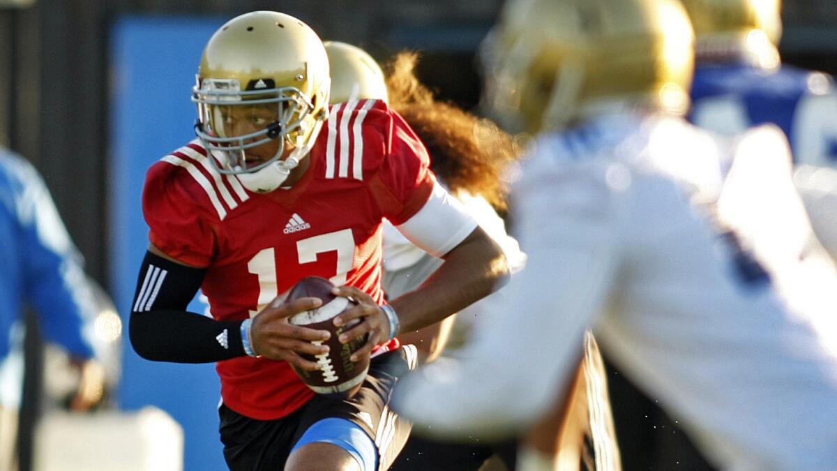 UCLA quarterback Brett Hundley takes part in a morning practice session at Spaulding Field in April. Are the Bruins finally on the verge of becoming one of the top teams in college football?