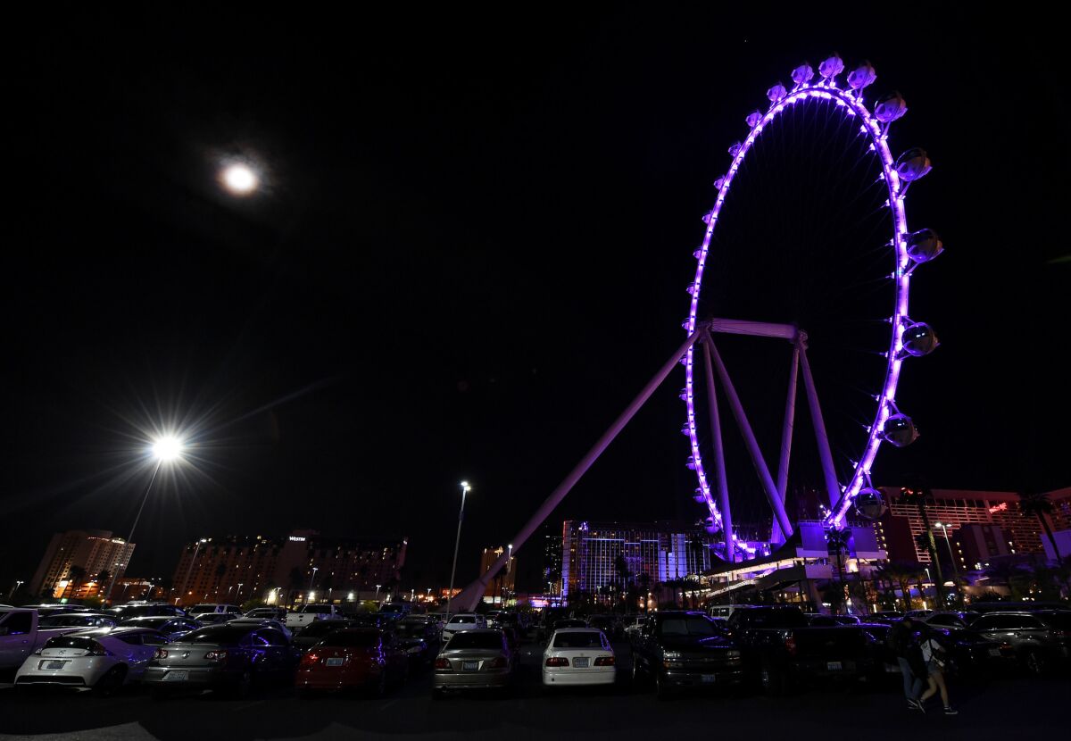 The High Roller Ferris wheel on the Las Vegas Strip was also lit purple.