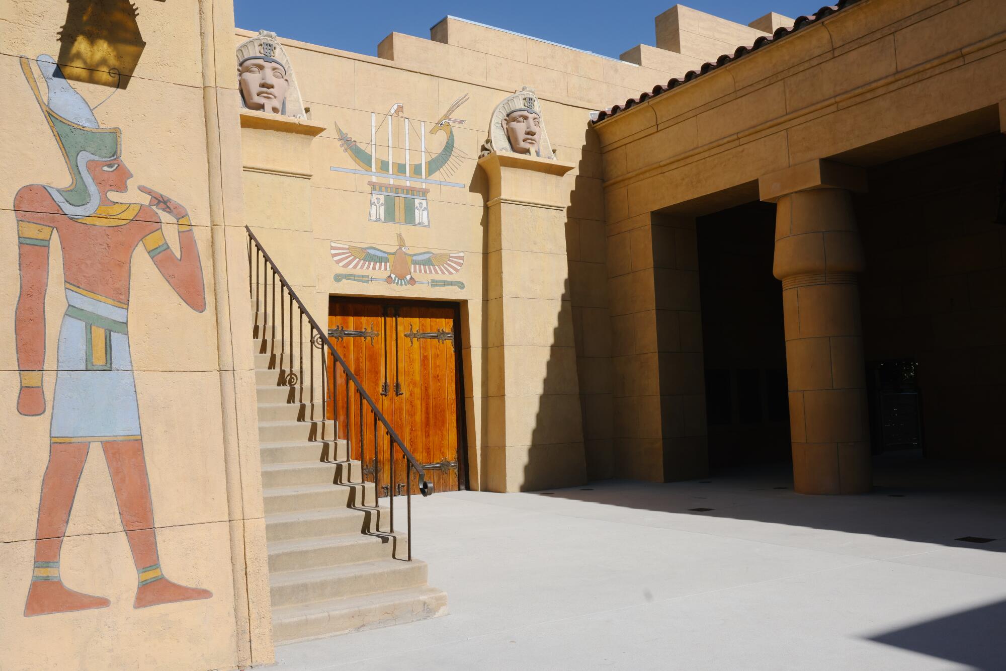 The Egyptian Theatre's forecourt has been restored with painted images and hieroglyphics.