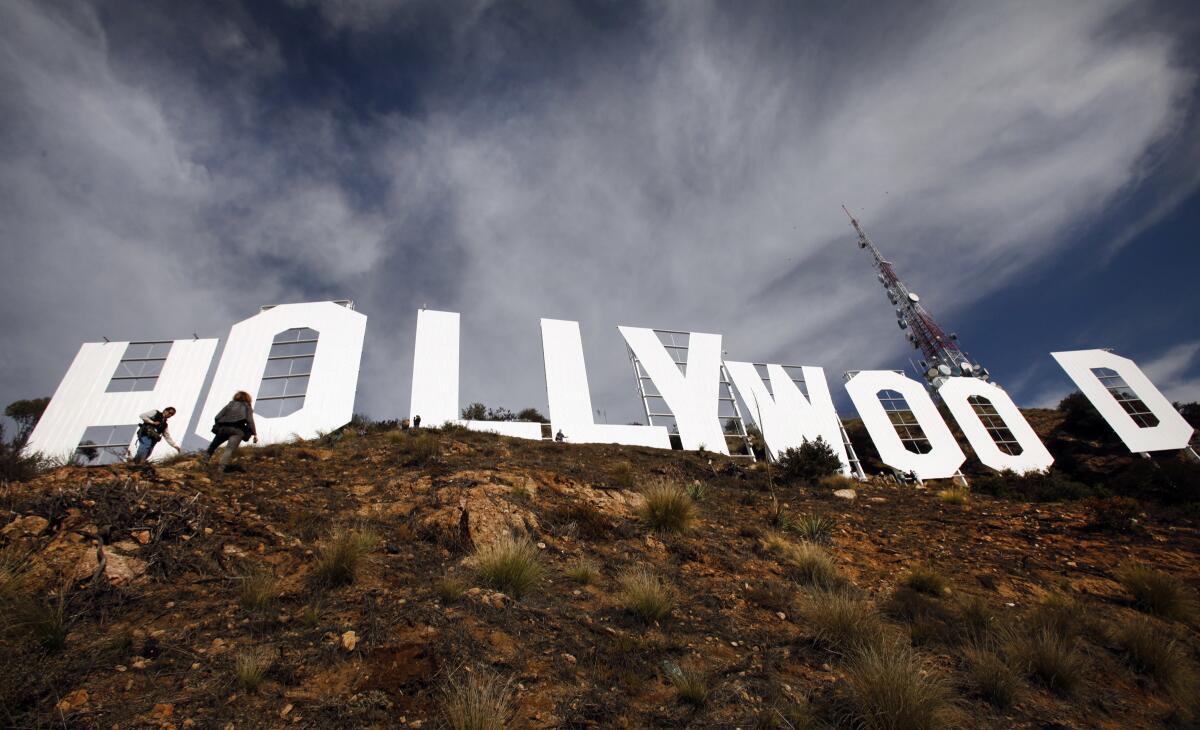 The Hollywood sign looming over a hill