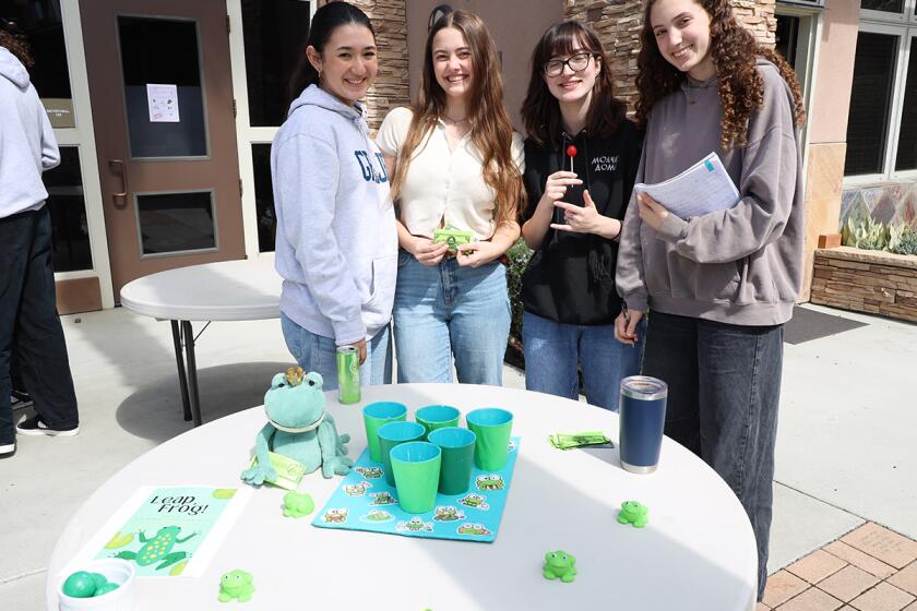 Students from The Grauer School learning about pre-calculus with fun carnival games.