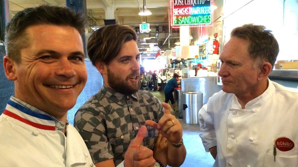 Rodolphe Le Meunier, left, Alex Brown of Hot Knives and chef Mark Peel at Grand Central Market.
