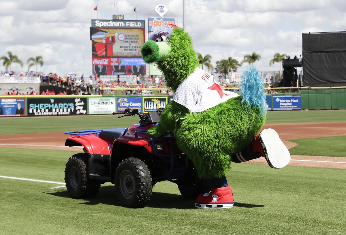 The new-look Phillie Phanatic performs before a Phillies-Pirates spring training game.
