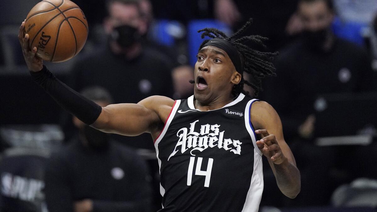 Clippers guard Terance Mann elevates for a layup.