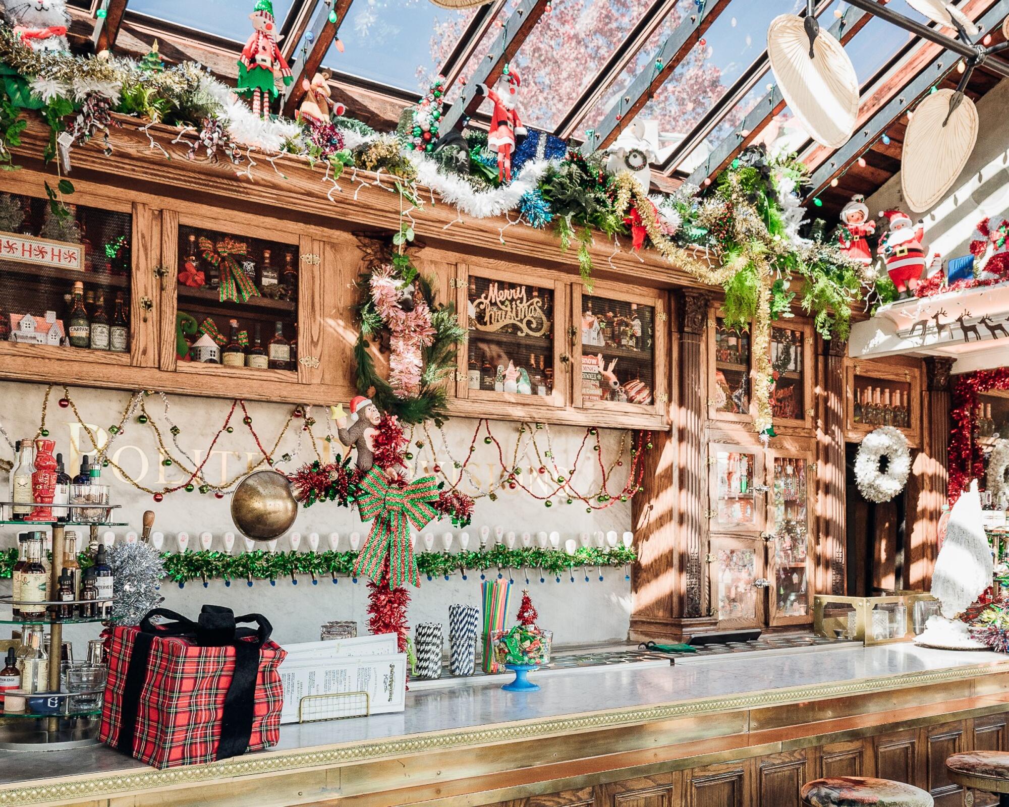 The holiday decorated bar at Polite Provisions.