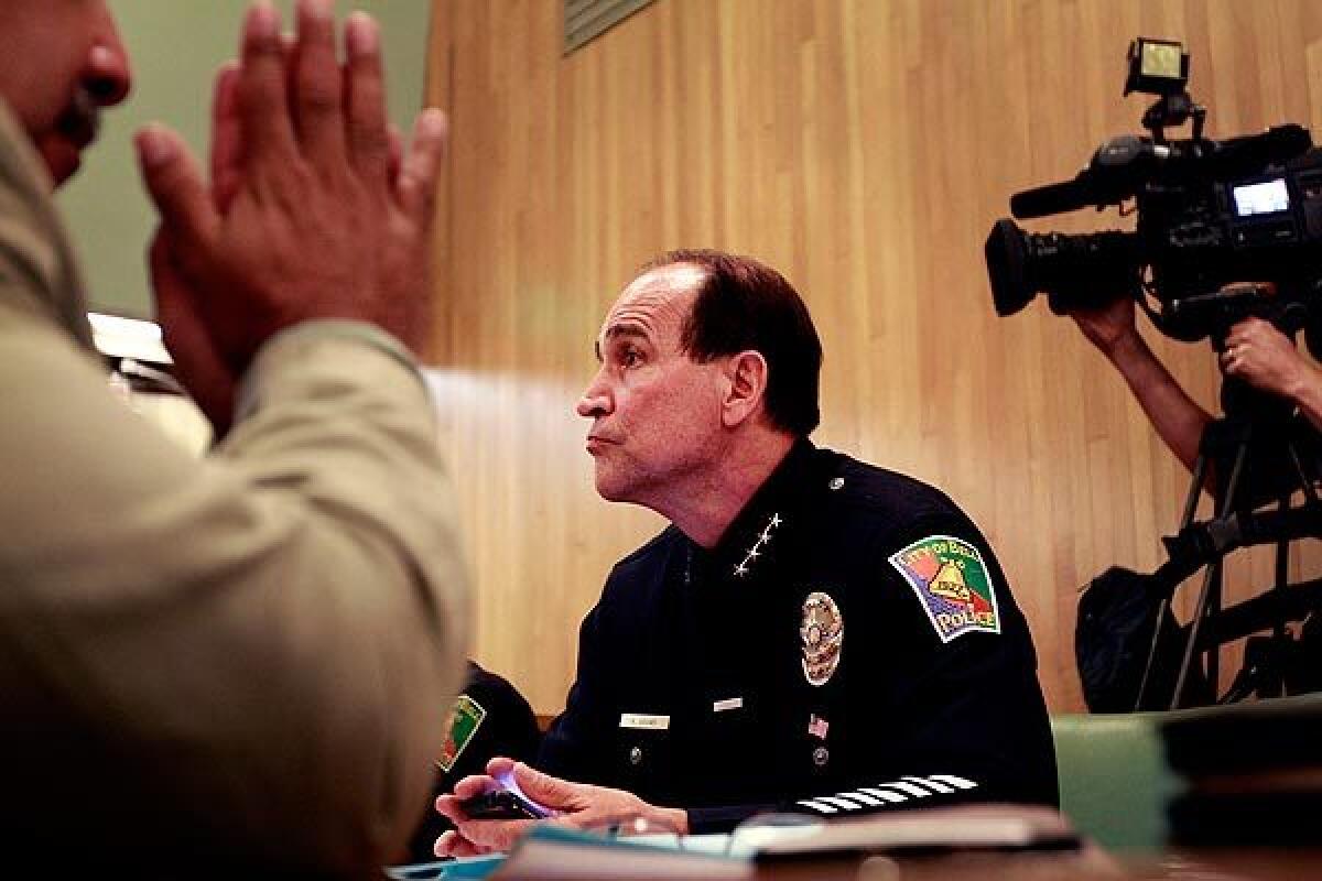 Bell Police Chief Randy Adams, whose $457,000 salary is 50% higher than that of his Los Angeles counterpart, attended the council meeting Monday. City Administrative Officer Robert Rizzo, whose salary is also causing an outcry, did not attend.