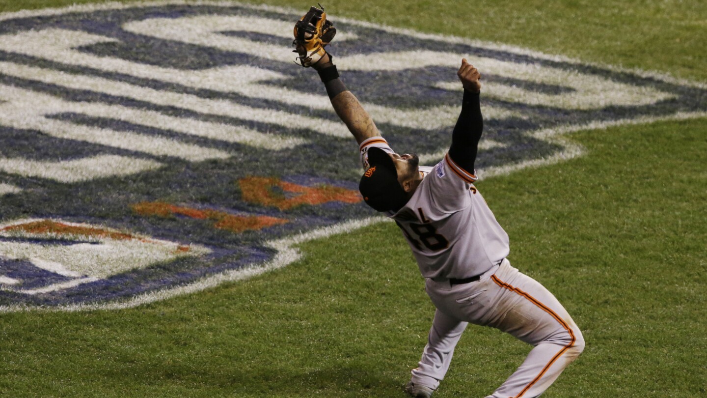 San Francisco Giants third baseman Pablo Sandoval celebrates immediately after recording the final out of a 3-2 win over the Kansas City Royals in Game 7 of the World Series.