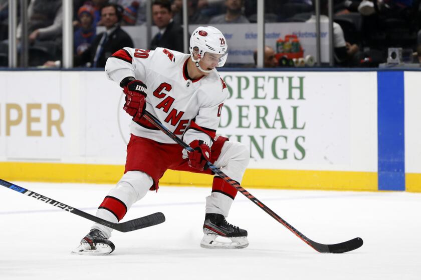 Carolina Hurricanes center Sebastian Aho (20) skates during an NHL hockey game against the New York Islanders, Saturday, March 7, 2020, in Uniondale, NY. (AP Photo/Jim McIsaac)