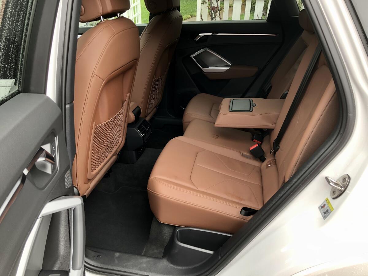 The tall AWD tunnel makes the Q3 a great four-seater, with reclining seatbacks and extended thigh support at the window seats.