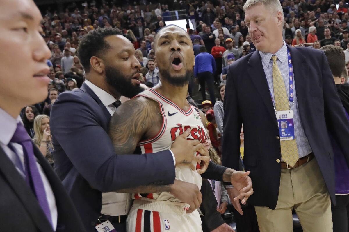 Trail Blazers guard Damian Lillard expresses his anger following a loss to the Jazz on Feb. 7, 2020, in Salt Lake City.