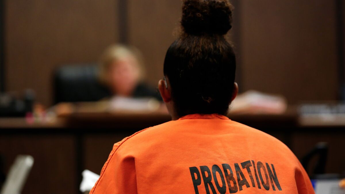 A juvenile respondent appears before Judge Catherine Pratt on a human trafficking case at the Compton Courthouse.