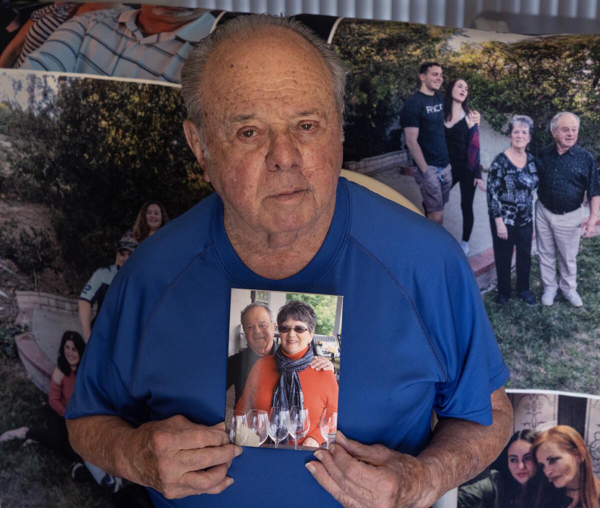 Erwin Goldbloom, the 90-year-old widower of Linda Goldbloom, holds a photo of him and his wife.