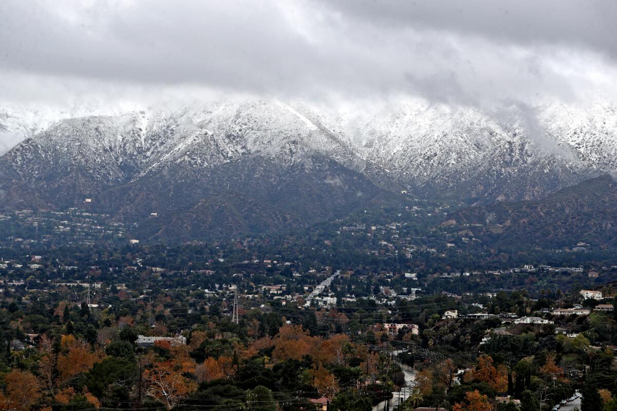 Snow blankets the mountains over La Cañada Flintridge