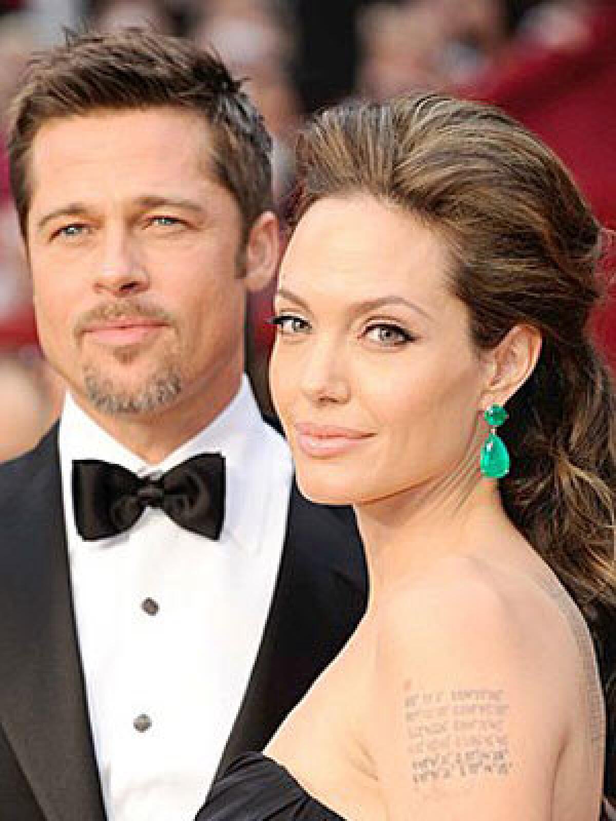 BRAD IS BAMM-BAMM? Angelina Jolie, with Pitt, learns from Pebbles.