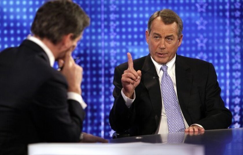 House Speaker John A. Boehner (R-Ohio), right, is interviewed by Bill Hemmer on Fox News Channel's "America's Newsroom."