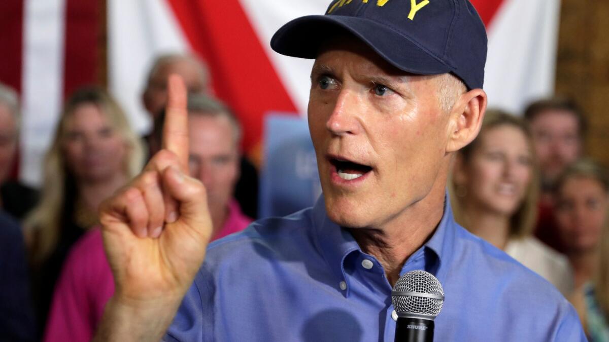 Florida Gov. Rick Scott announces his bid to run for the U.S. Senate at a news conference Monday in Orlando, Fla.
