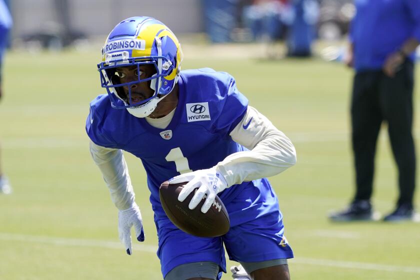 Los Angeles Rams wide receiver Allen Robinson II runs a route at the NFL football team's practice facility Monday, May 23, 2022, in Thousand Oaks, Calif. (AP Photo/Marcio Jose Sanchez)