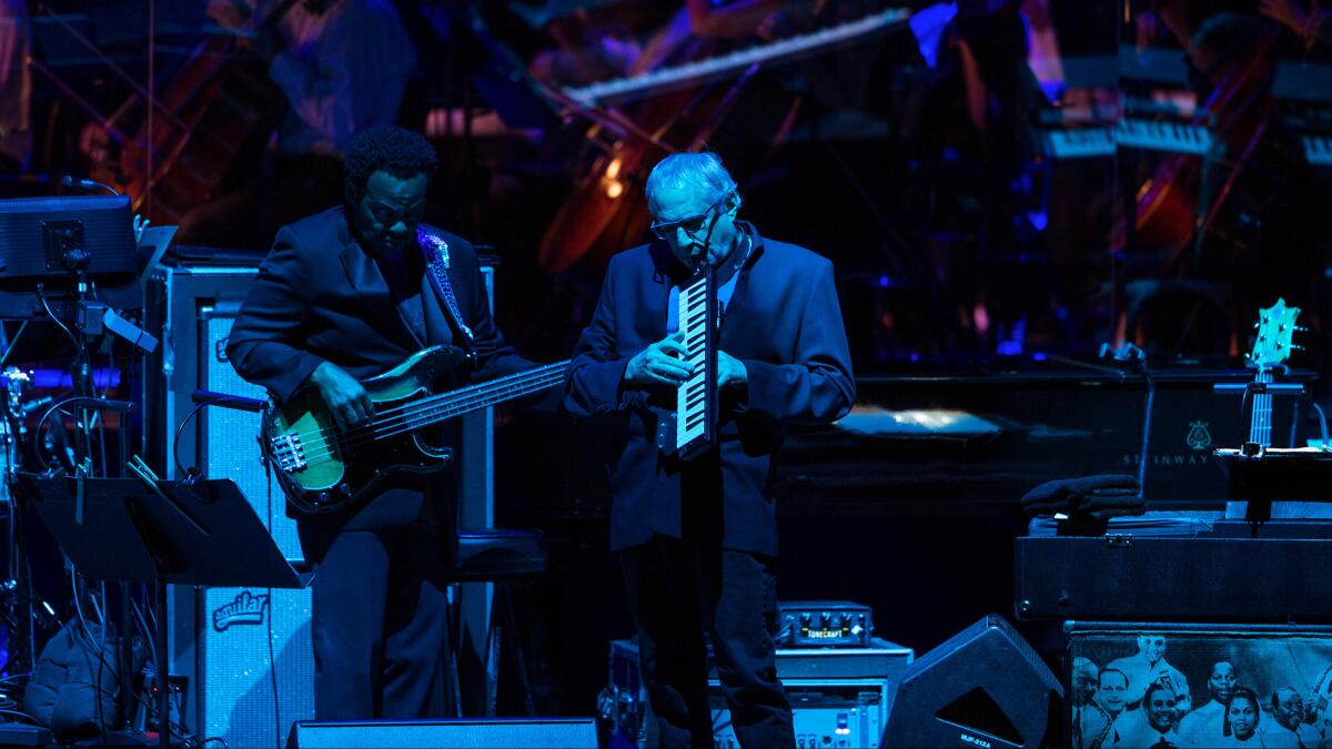 Donald Fagen, center, performs with Steely Dan on Saturday at the Hollywood Bowl.