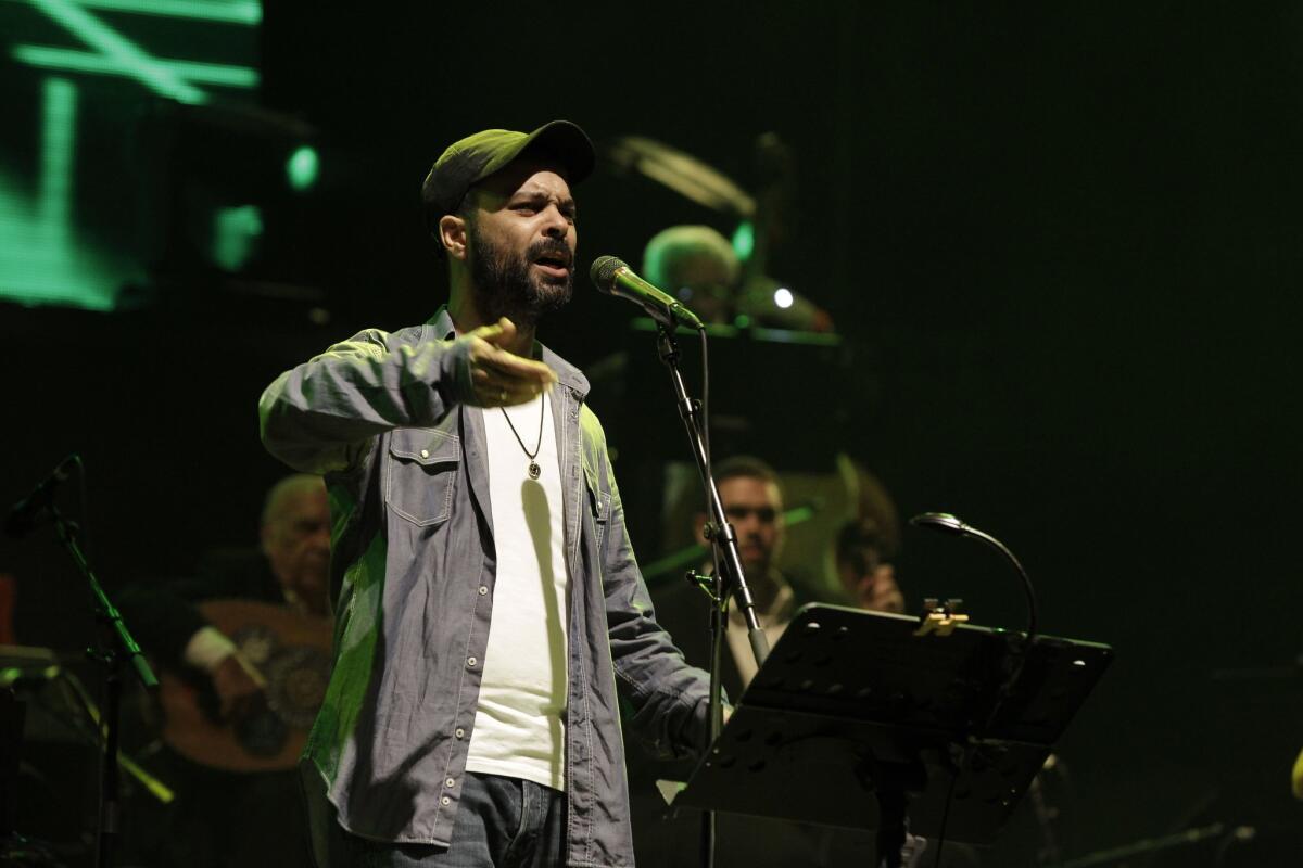 Israeli singer-songwriter Amir Benayoun during a concert in Ashdod, Israel, in May 2013.