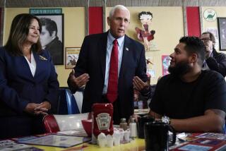 FILE - Republican presidential candidate former Vice President Mike Pence and his wife Karen, left, chat with a patrons during a campaign stop at a diner, June 9, 2023, in Derry, N.H. Weary Republicans who acknowledge Donald Trump's dominance, across New Hampshire are fighting to stop the former president from winning the first-in-the-nation primary. For now, however, they're relying on little more than hope and prayers. Look no further than Pence, who repeatedly appealed to voters' faith as he tried to resurrect his anemic presidential campaign while courting a few dozen voters in a former state lawmaker's backyard. (AP Photo/Charles Krupa, File)