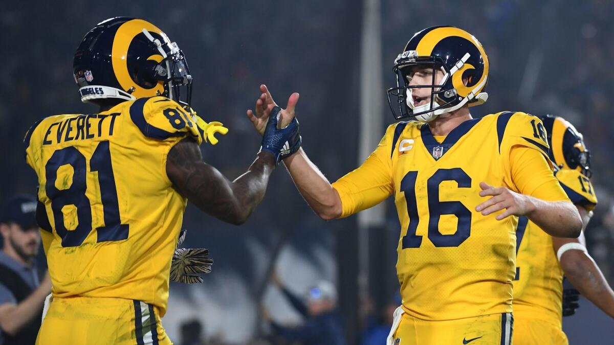 Rams quarterback Jared Goff (16) celebrates with tight end Gerald Everett after a touchdown against the Chiefs.