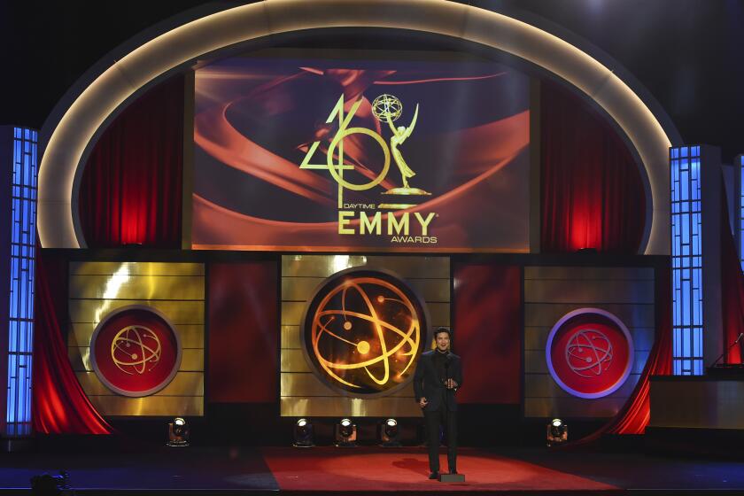 FILE - This May 5, 2019 file photo shows host Mario Lopez on stage at the 46th annual Daytime Emmy Awards in Pasadena, Calif. The Daytime Emmy Awards are skipping a theater ceremony because of the coronavirus but the honors will be presented on a TV broadcast on June 26. Nominations for the 47th annual Daytime Emmys will be announced Thursday on CBS’ “The Talk,” with categories including best drama series, talk show and game show. The TV academy that organizes the daytime awards had announced it wouldn’t hold the traditional theater ceremony out of pandemic safety concerns. (Photo by Chris Pizzello/Invision/AP, File)