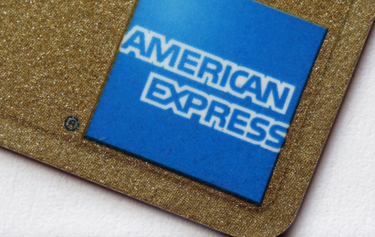 A judge on Thursday ruled that American Express violated U.S. antitrust laws by barring merchants from asking customers to prefer one credit card over another.