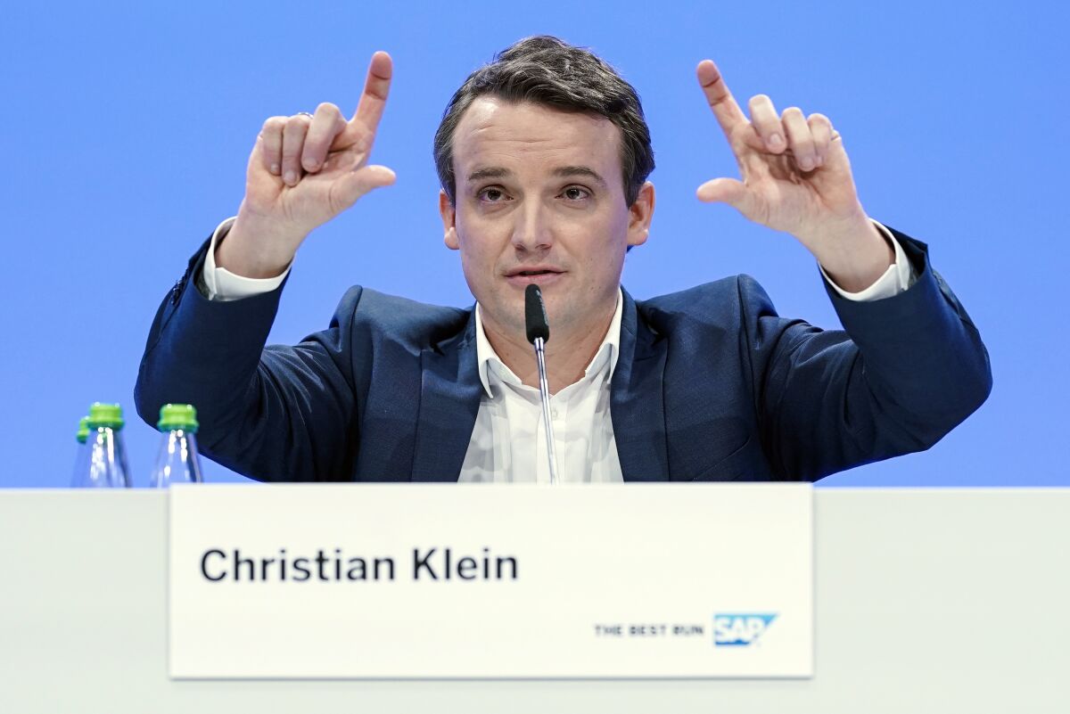 Christian Klein, CEO of the software group SAP, gestures during the annual press conference of the software group SAP in Walldorf, Germany, Jan.29, 2021. April 2022 marks SAP's 50th anniversary and the culmination of Klein's first year as sole CEO. (Uwe Anspach/Pool via AP)