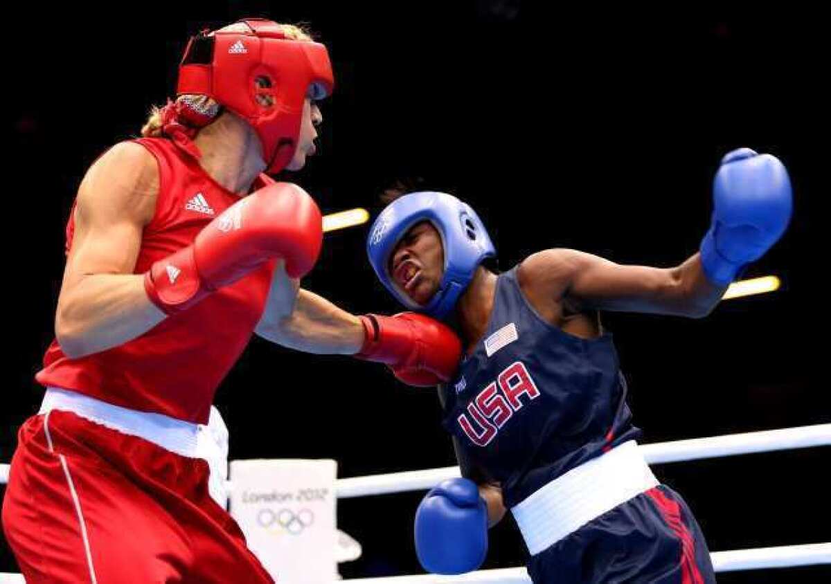 Claressa Shields of the U.S. competes against Anna Laurell of Sweden.
