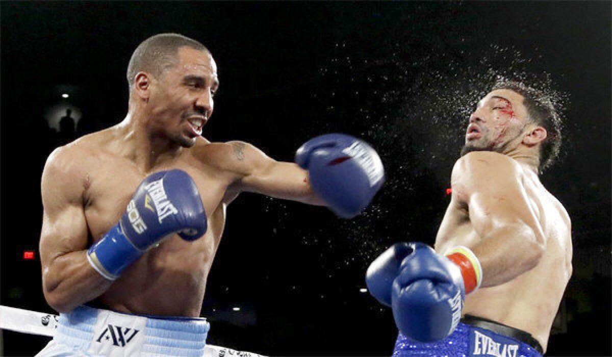 Andre Ward connects with a left to Edwin Rodriguez during the 12th round of their super-middleweight title boxing match at Citizens Business Bank Arena in Ontario, Calif. Ward won by unanimous decision, retaining his title.