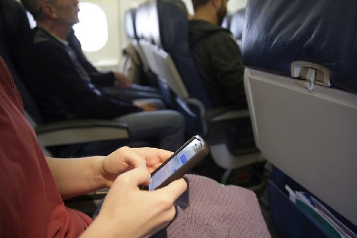 The Federal Communications Commission is considering allowing fliers to make in-flight voice calls on their cellphones once the plane reaches 10,000 feet.