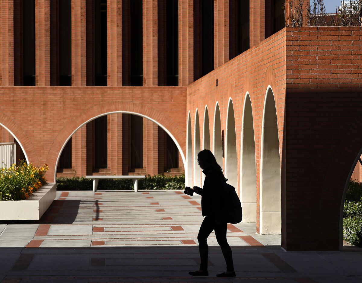 A student walks on the USC campus near downtown Los Angeles in 2018.