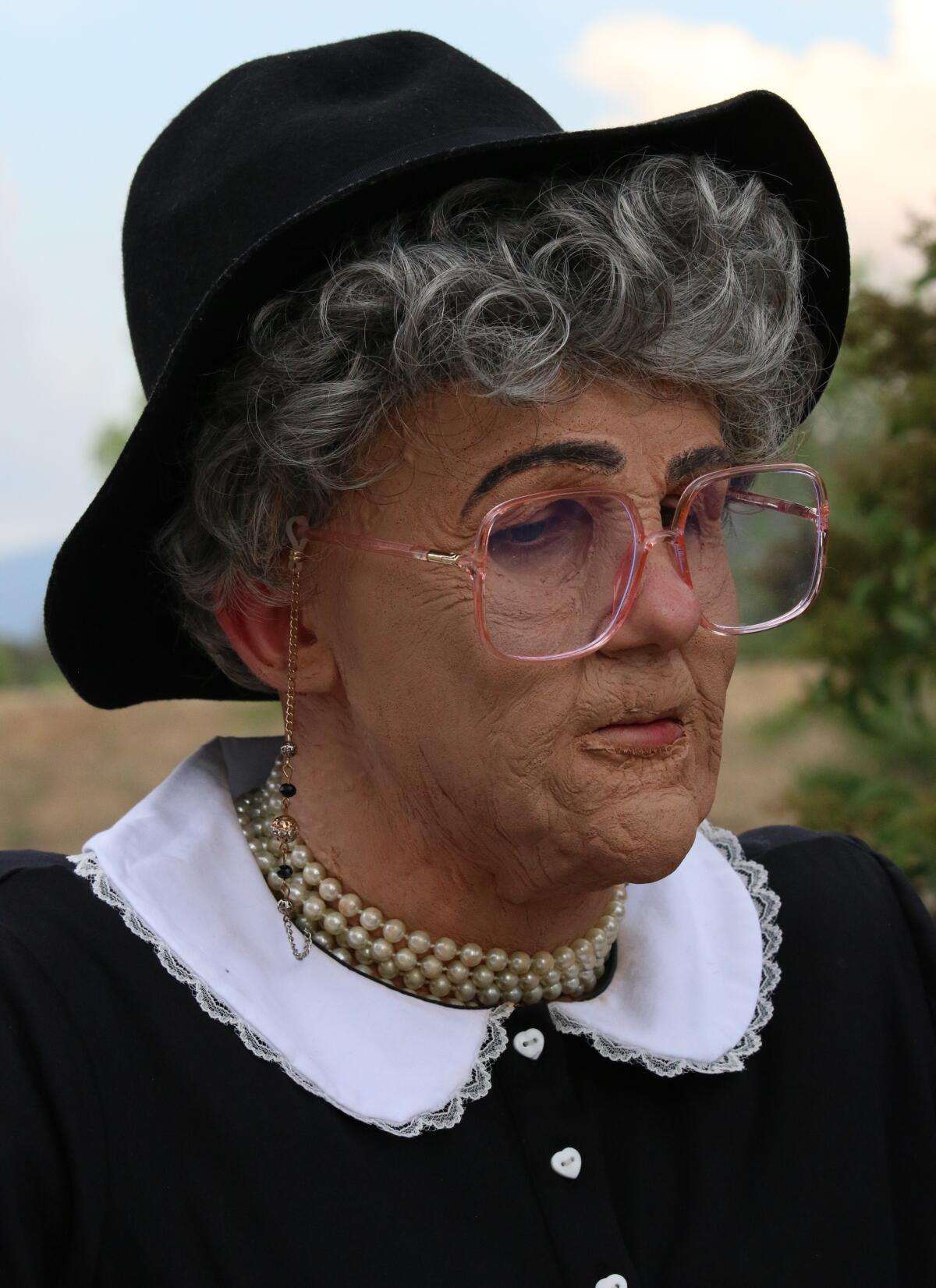 Screenwriter, film director and actor Brian Patrick Butler dressed as the landlady, Liz Topham-Myrtle, in “Hemet.”