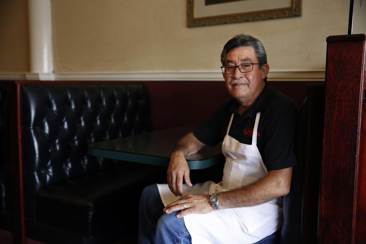Manager Chuy Ortiz at Petrillo's pizza parlor on Valley Boulevard looks forward to welcoming back diners after a remodel.
