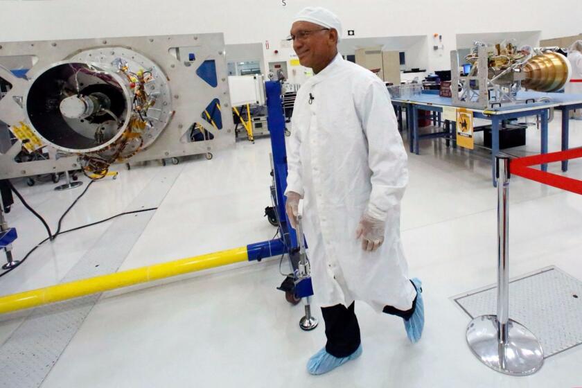 NASA Administrator Charles Bolden visits the Jet Propulsion Laboratory to check on the progress of two Earth-observing missions.