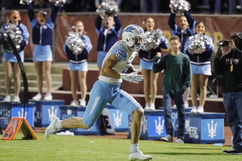 Corona del Mar's John Humphreys runs for a touchdown against Alemany in a CIF Southern Section Division 3 semifinal football game at Bishop Alemany High School in Mission Hills on Friday, November 22, 2019.