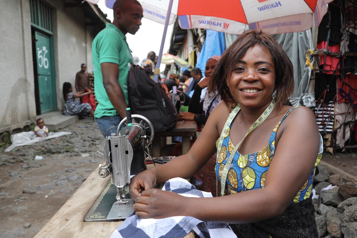 Kajang Anuaritte, a 27-year-old tailor and mother of five children, works out of Virunga market in Goma, Congo. “There’s hundreds of us here packed together, it will spread easily," she said of the coronavirus.