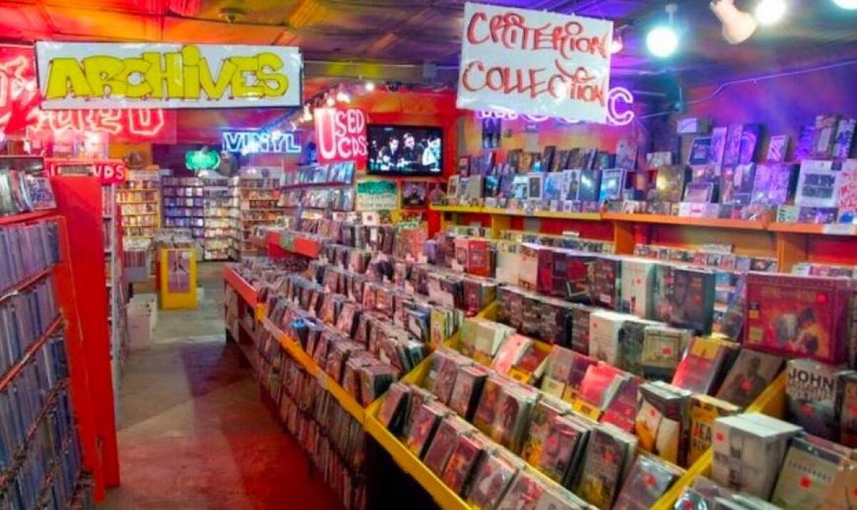 A video store is crammed with discs for sale.