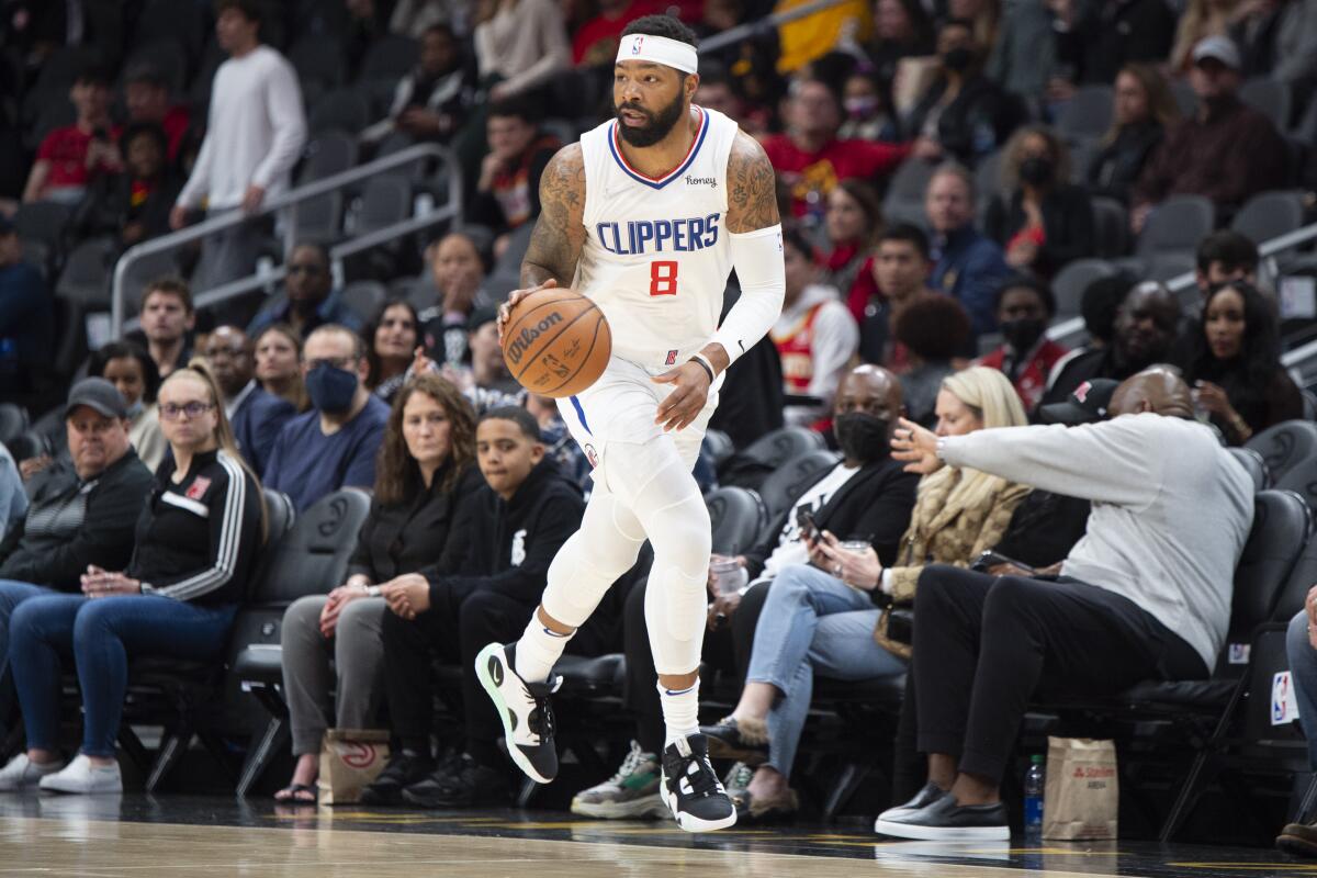 Clippers forward Marcus Morris Sr. handles the ball during the first half March 11, 2022.