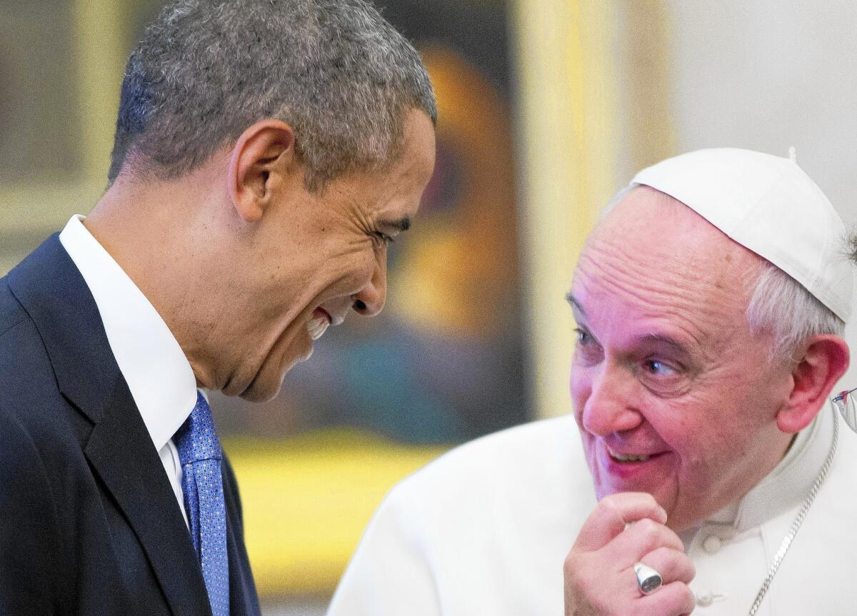 President Obama and Pope Francis talk at the Vatican. The president introduced himself to Francis as a “great admirer.”